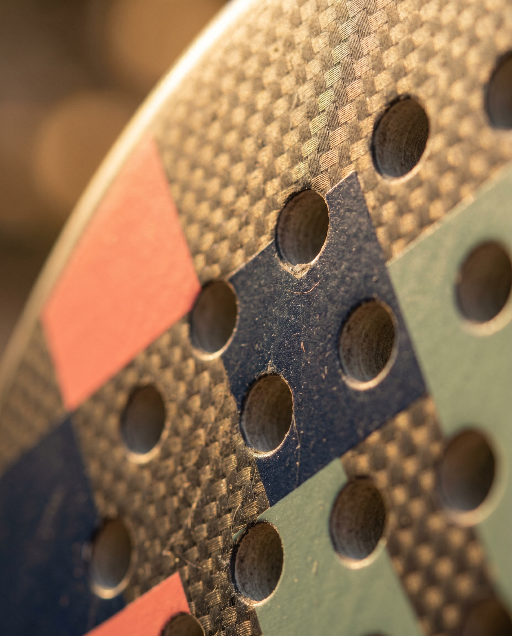 Macro of a carbon padel paddle face