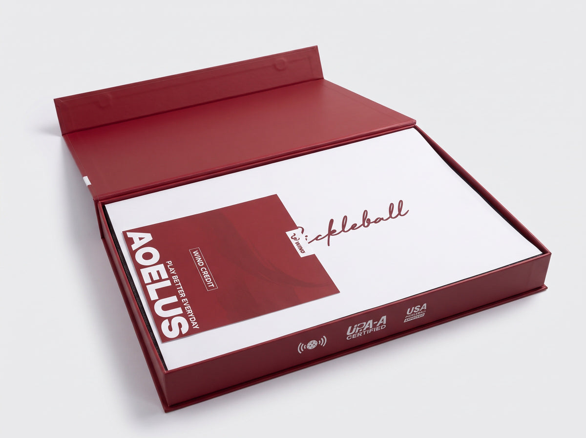 Single paddle presentation box with its two printed paper pieces, the film over the foam and the card on top