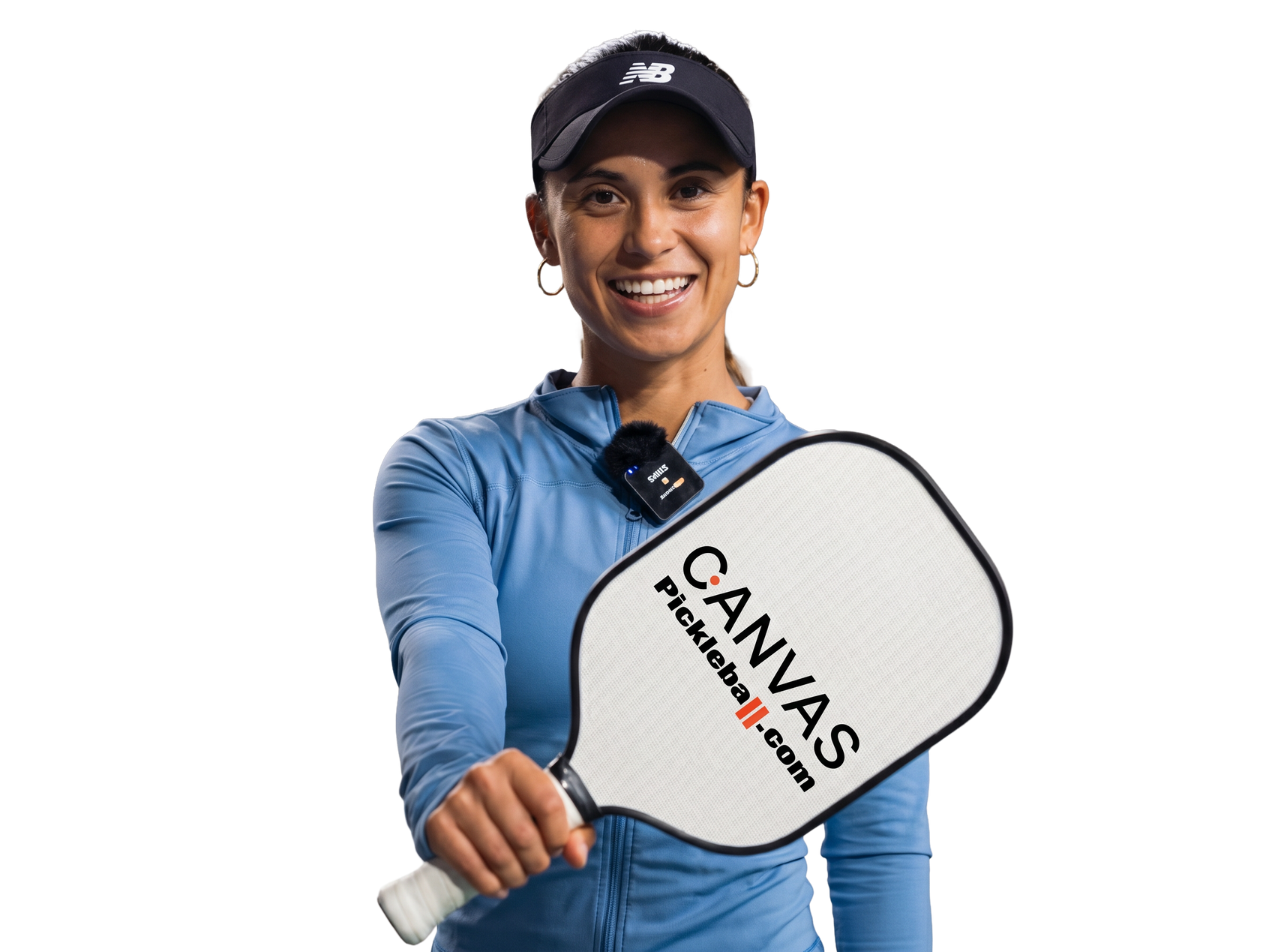 Pro pickleball player holding a Canvas pickleball paddle against a white background